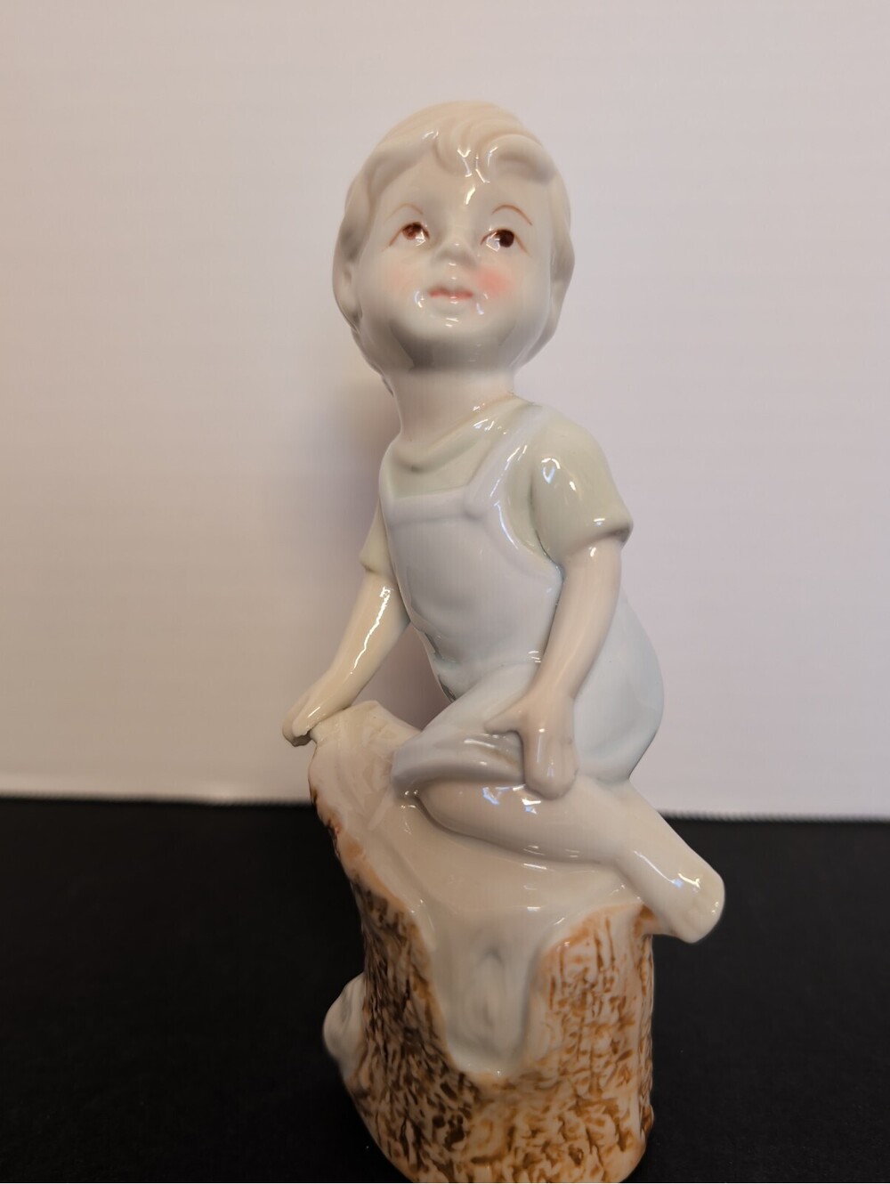 Glossy Porcelain Boy Kneeling On A Tree Stump Vintage